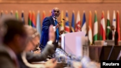 Uganda's permanent representative to the United Nations Adonia Ayebare speaks during the opening of the 19th Non-Aligned Movement (NAM) Summit in Kampala's Munyonyo suburb, Uganda, Jan. 15, 2024.