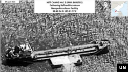 북한의 제재대상 유조선 '유선호'가 올해 4월 남포항에서 정제유를 하역하는 모습을 촬영한 위성사진을, 유엔 대북제재위원회가 지난 9월 발표한 보고서에서 공개했다.