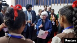 US Treasury Secretary Janet Yellen and World Bank President Ajay Banga interact with the students during their visit to Vidya Samiksha Kendra at Gandhinagar, India, July 16, 2023. 