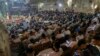 On Christmas Eve according to the Julian calendar, hundreds of Coptic Christians attend a Mass with a sermon that calls on worshippers to find peace in poverty. Cairo, Egypt, Jan. 6, 2024. (Hamada Elrasam/VOA)