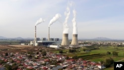 FILE - Guohua Power Station, a coal-fired power plant, operates in Dingzhou, Baoding, in the northern China's Hebei province, Nov. 10, 2023.