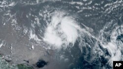 This GeoColor satellite image taken June 20, 2023, and provided by NOAA, shows Tropical Storm Bret as it chugged toward the eastern Caribbean.