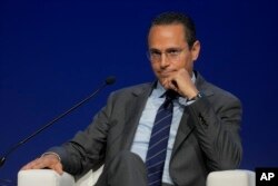 FILE - Wael Sawan, Shell CEO, takes part in a conference in Abu Dhabi, United Arab Emirates, Oct. 2, 2023.