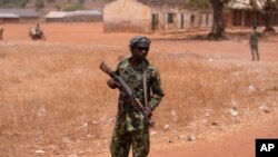 A Nigerian soldier patrol sat the LEA Primary and Secondary School Kuriga where students were kidnapped in Kuriga, Kaduna Nigeria, March 9, 2024.