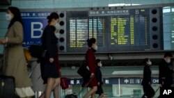 Bandara Internasional Ibu Kota Beijing di Beijing, Rabu, 26 April 2023. China tidak lagi mewajibkan hasil tes COVID-19 negatif bagi wisatawan pendatang mulai Rabu (30/8). (Foto: AFP)