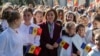 FILE - Moldovan President Maia Sandu meets with children during a ceremony marking the National Flag Day in Chisinau, April 27, 2024. 