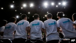 FILE - Demosisto party members are introduced at a news conference in Hong Kong, April 10, 2016. Hong Kong security police on July 5, 2023, arrested four members of the defunct party on suspicion of colluding with foreigners.