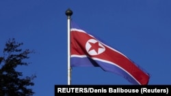Zastava Severne Koreje (REUTERS/Denis Balibouse)