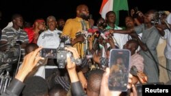 Kemi Seba, a Franco-Beninese firebrand pro-Russia activist, speaks to supporters of the junta that seized power in Niger in July, during a rally near the French military base, calling for the withdrawal of French forces, in Niamey, Niger, Sept. 28,2023.