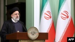 FILE - A handout picture provided by the Iranian Presidency shows the Islamic republic's President Ebrahim Raisi speaking in Tehran, Nov. 6, 2023.