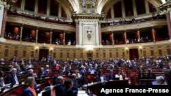 French senators attend a debate for a vote on a government plan to enshrine the right to have an abortion in the French Constitution, at the French Senate in Paris, on Feb. 28, 2024.