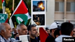 FILE - Protesters shout anti-Israel slogans during a sit-in in support of Palestinians, in Manama, Bahrain, Oct. 27, 2023. 