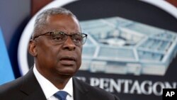 FILE - U.S. Secretary of Defense Lloyd Austin speaks at the Pentagon, near Washington, July 18, 2023.