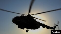 A Ukrainian military Mi-8 helicopter is seen in an undisclosed location in Eastern Ukraine, Sept. 29, 2023.