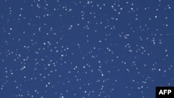 Flyers dropped by the Israeli military over Gaza City warn residents to flee "immediately" to the south. A map featured on the flyers showed an arrow pointing south across a line in the central Gaza Strip, Oct. 13, 2023.