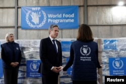 U.S. Secretary of State Antony Blinken visits a World Food Program (WFP) regional warehouse, during Blinken's week-long trip aimed at calming tensions across the Middle East, in Amman, Jordan, Jan. 7, 2024.