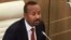 FILE - Ethiopian Prime Minister Abiy Ahmed speaks in parliament in Addis Ababa, Ethiopia, July 4, 2024. He said on Friday that the federal government has been reaching out to rebels in the Amhara region in an effort to resolve the ongoing conflict there.