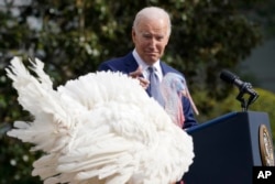 President Joe Biden speaks after pardoning the national Thanksgiving turkey, Liberty, during a pardoning ceremony at the White House in Washington, Monday, Nov. 20, 2023. (AP Photo/Susan Walsh)