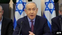 Israeli Prime Minister Benjamin Netanyahu chairs a Cabinet meeting at the Kirya, which houses the Israeli Ministry of Defense, in Tel Aviv, Israel, Dec. 31, 2023.