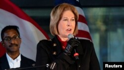 FILE - Attorney Sidney Powell speaks at a press conference on election results in Alpharetta, Georgia, Dec. 2, 2020.