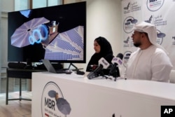 Mohsen Al Awadhi, director of UAE Space Missions Department, right, and Hoor AlMaazmi UAE, space science researcher, take part at a press conference, in Dubai, United Arab Emirates, May 29, 2023.