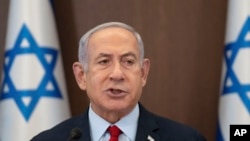 Israeli Prime Minister Benjamin Netanyahu chairs a cabinet meeting at the Prime Minister's Office in Jerusalem, June 18, 2023.