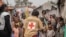 Red Cross officials create awareness of mpox in the Don Bosco refugee camp in Goma, Democratic Republic of the Congo, Aug. 22, 2023.