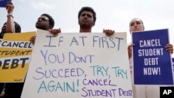 People in favor of canceling student debt protest outside the Supreme Court, June 30, 2023, in Washington. 