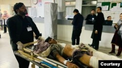 А boy, injured in a bomb explosion, is transported for treatment at a hospital in Peshawar, Pakistan, Dec. 5, 2023. (Photo courtesy of Peshawar Police)