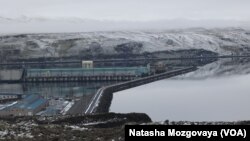 Wanapum Dam on Columbia River in East Washington. Cheap hydro power attracts to the area companies producing renewables.