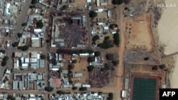 FILE - May 17, 2023, photo released by Maxar Technologies, the market of El Geneina, the capital of West Darfur. Sudan's war rages on as the reported death toll topped 2,000.