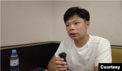 Karson，在英国寻求政治庇护的港人 （照片来源：美国之音采访视频截图）