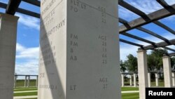 FILE - Names of some of the 22,442 who died under British command between D-Day and the end of the Battle of Normandy are displayed at the British Normandy Memorial, in Ver-sur-Mer, France, July 30, 2023. 