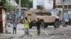 Haitian Police Say Gangs Overwhelmed, Killed 4 Officers; City Center 'at War' 