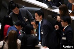 Pita Limjaroenrat, leader of the Move Forward Party looks on after Thailand's Constitutional Court ordered his temporary suspension from the parliament, on the day of the second vote for a new prime minister, at parliament, in Bangkok, Thailand, July 19, 2023. REUTERS/Chalinee Thirasupa