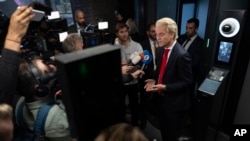 FILE - Geert Wilders, leader of the Netherlands' far-right Party for Freedom, talks to the media two days after he won the most votes in a general election in The Hague, Netherlands, Nov. 24, 2023.