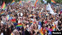 People take part in an annual LGBT Equality Parade in Warsaw, Poland, June 17, 2023.
