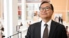 FILE - Cambodian opponent in exile and leader of the Cambodia National Rescue Party (CNRP) Sam Rainsy, speaks to the press as he arrives at the court house accused in a defamation lawsuit filed by Cambodia's prime minister, in Paris on September 1, 2022.