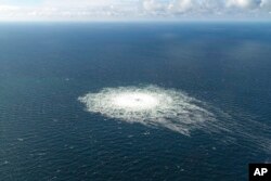 A large disturbance in the sea can be observed off the coast of the Danish island of Bornholm, Sept. 27, 2022, following a series of unusual leaks on two natural gas pipelines running from Russia under the Baltic Sea to Germany have triggered concerns about possible sabotage.