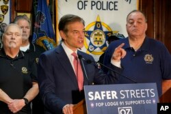 Dr. Mehmet Oz, Republican candidate for U.S. Senate in Pennsylvania, visits the Fraternal Order of Police Lodge 91 in West Homestead, Pa., Oct. 18, 2022.