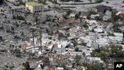 Damaged homes and debris are shown in the aftermath of Hurricane Ian, Sept. 29, 2022, in Fort Myers, Fla. 