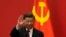 FILE - Chinese President Xi Jinping waves at the Great Hall of the People in Beijing on Oct. 23, 2022. After he was named to another term as head of the ruling Communist Party, Xi strengthened his grip on China's military command.