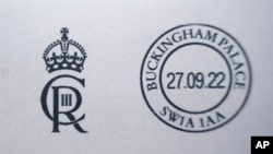 The new cypher of Britain's King Charles III in the Court Post Office at Buckingham Palace, London, Sept. 27, 2022. 