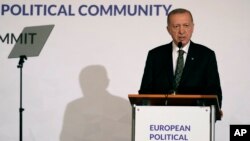 Turkey's President Recep Tayyip Erdogan speaks during a media conference after a meeting of the European Political Community at Prague Castle, in Prague, Czech Republic, Oct. 6, 2022.