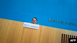 German Health Minister Karl Lauterbach talks to press in Berlin, on Oct. 26, 2022, the day Germany unveiled plans to legalize cannabis, potentially making it one of the first countries in Europe to make marijuana legal. 
