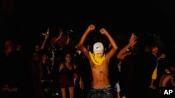 People protest asking for the restoration of the electrical service that collapsed last Tuesday due to the devastation of Hurricane Ian in Bacuranao, Sept. 30, 2022. 