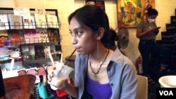 Silingan customer Patricia Tierra, a local university student, says listening to coffee shop employees' stories puts a human face on the consequences of former Philippines President Rodrigo Duterte's drug war. (Dave Grunebaum/VOA)