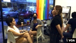 Sharon Angeles, like other baristas at Silingan coffee shop near Manila, often shares her personal stories of the war on drugs with the customers. (Dave Grunebaum/VOA)