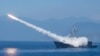 A Cheng Kung class frigate fires an anti air missile as part of a navy demonstration in Taiwan's annual Han Kuang exercises off the island's eastern coast near the city of Yilan, Taiwan, July 26, 2022.