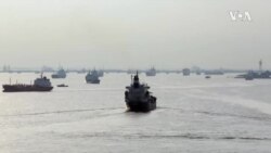 Des gros navires qui avancent à l'éolienne